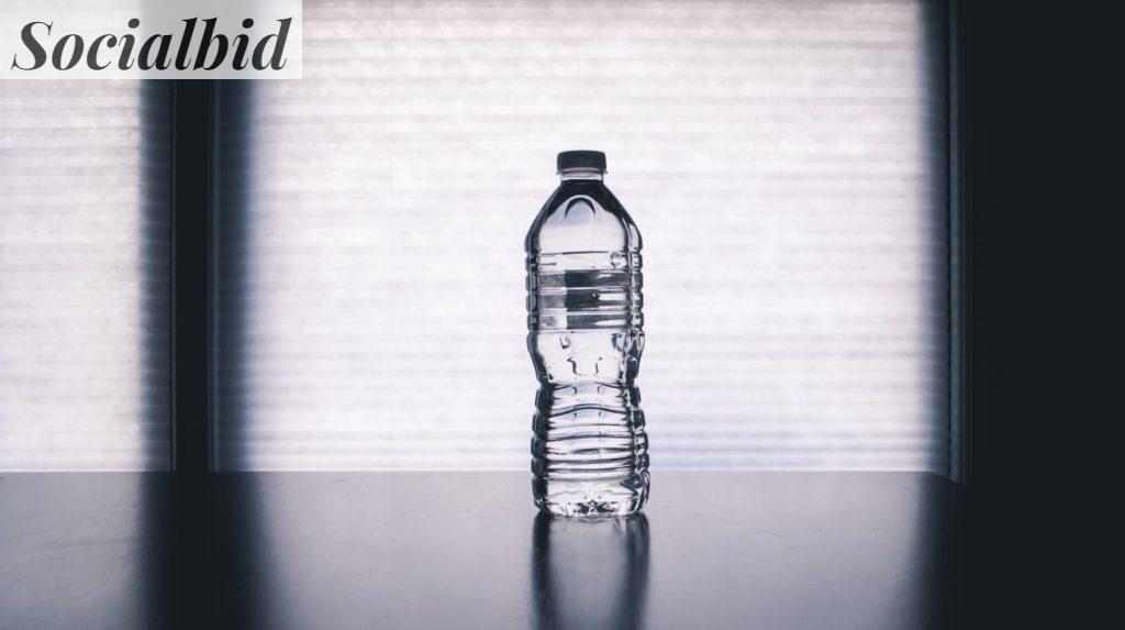 Clear Disposable Bottle on Black Surface