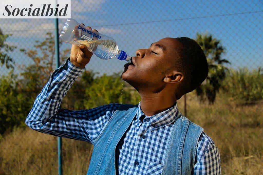 Photography of A Man Drinking Water